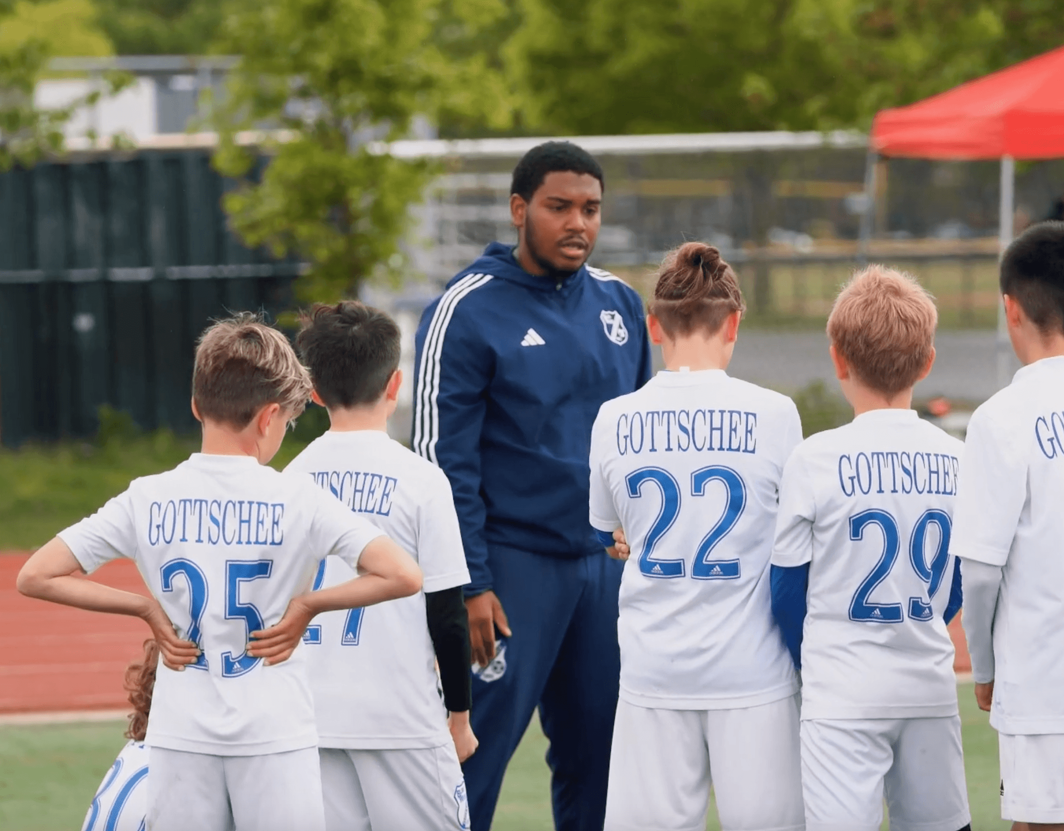 Zone 1 Coach teaches kids how to play soccer